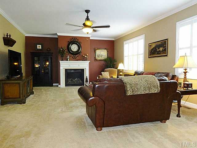 3212 Queensland Road Raleigh, NC 27614 - Photo 8 of 25 Large, airy and comfortable are great words to describe the family room. Keep an eye of the children while you prepare meals. A hall off the family room connects to the mud room with sink and the 3 car garage. Den/Family/Great Room