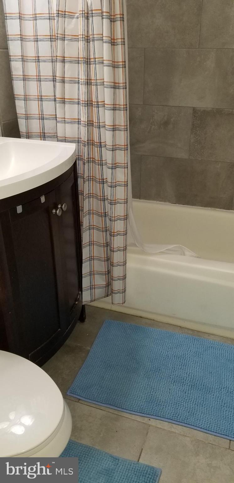 7717 Normandy Road Landover, MD 20785 - Photo 16 of 16 bathroom with bathtub view