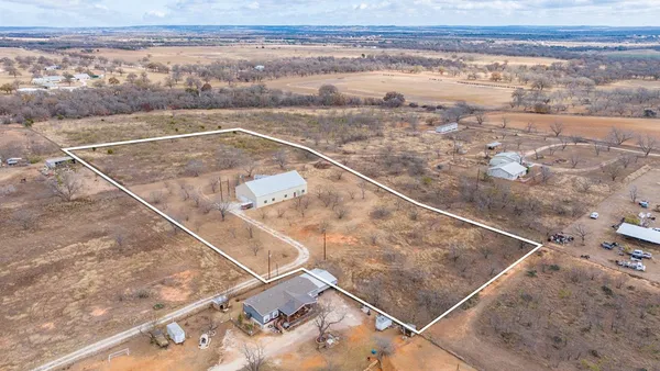 an aerial view of beach and city