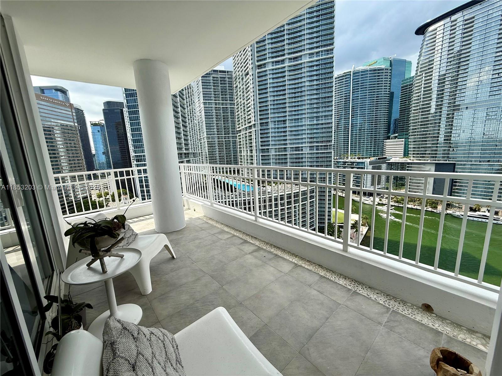 801 Brickell Key Boulevard, Unit 2402 Miami, FL 33131 - Photo 16 of 37 a view of balcony with couch