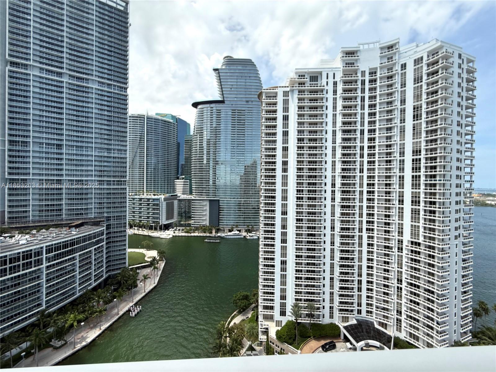 801 Brickell Key Boulevard, Unit 2402 Miami, FL 33131 - Photo 17 of 37 a view of a city with tall buildings