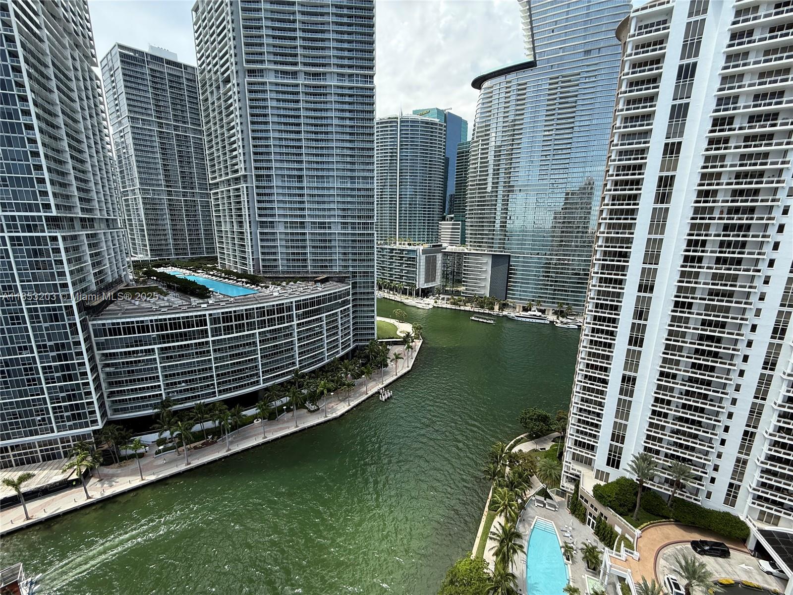 801 Brickell Key Boulevard, Unit 2402 Miami, FL 33131 - Photo 18 of 37 a view of a swimming pool with outdoor space