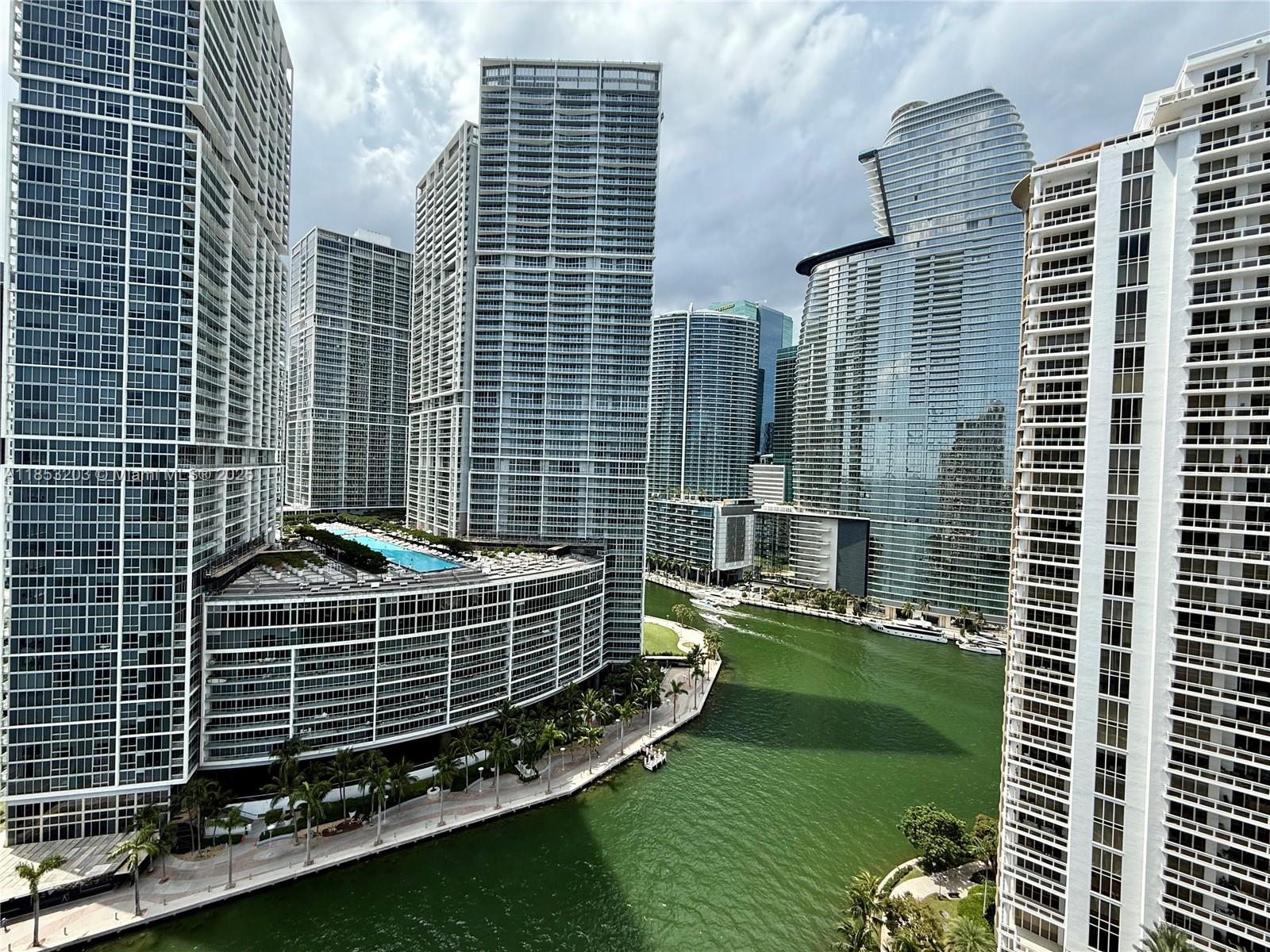 801 Brickell Key Boulevard, Unit 2402 Miami, FL 33131 - Photo 19 of 37 a view of a balcony with a yard