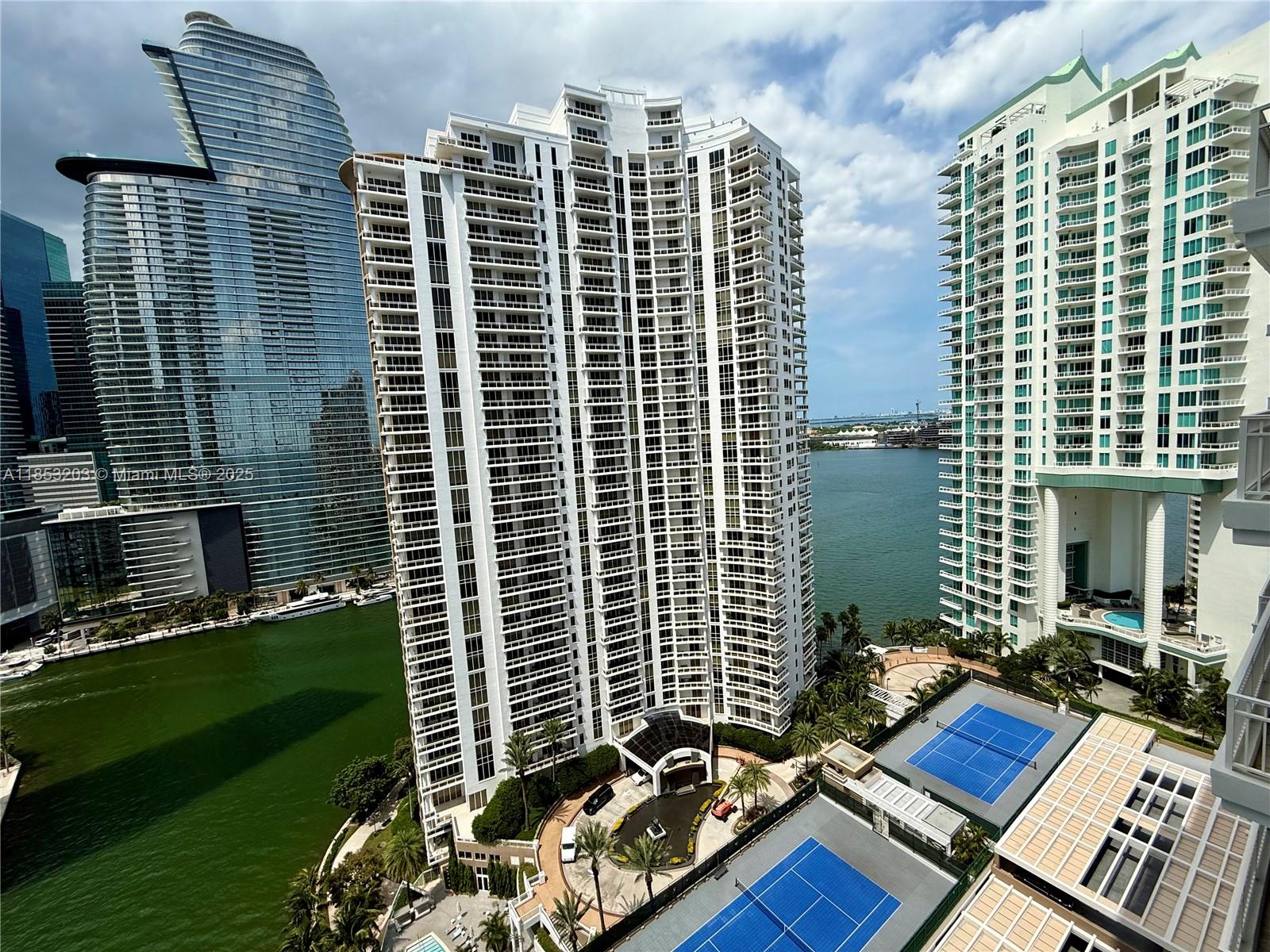 801 Brickell Key Boulevard, Unit 2402 Miami, FL 33131 - Photo 20 of 37 a view of balcony with a yard