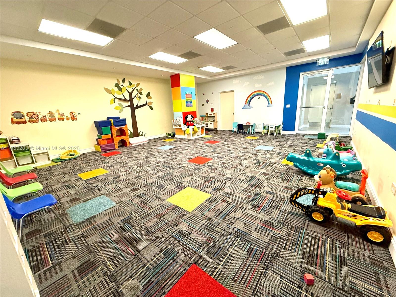 801 Brickell Key Boulevard, Unit 2402 Miami, FL 33131 - Photo 22 of 37 a living room filled with furniture