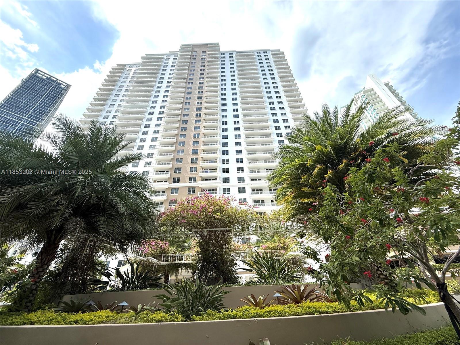 801 Brickell Key Boulevard, Unit 2402 Miami, FL 33131 - Photo 35 of 37 a view of a multi story yard