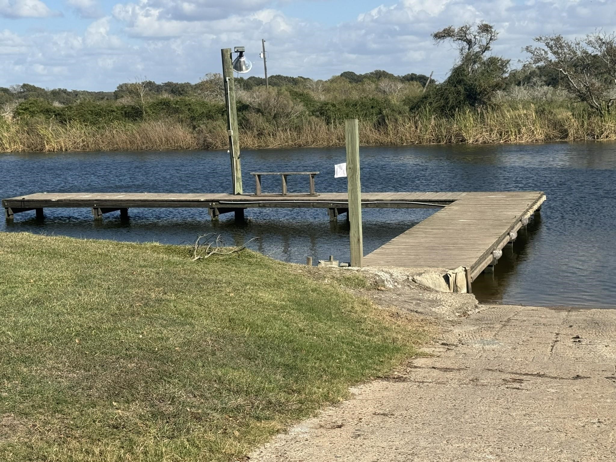16 Meadowlark South Palacios, TX 77465 - Photo 15 of 22 a view of a lake with a mountain in the background