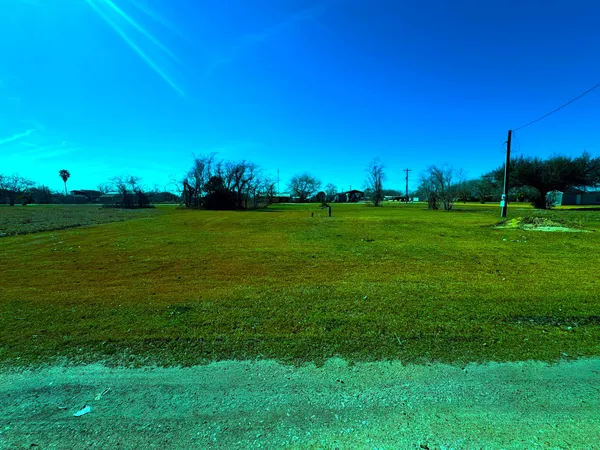 a view of a grassy field