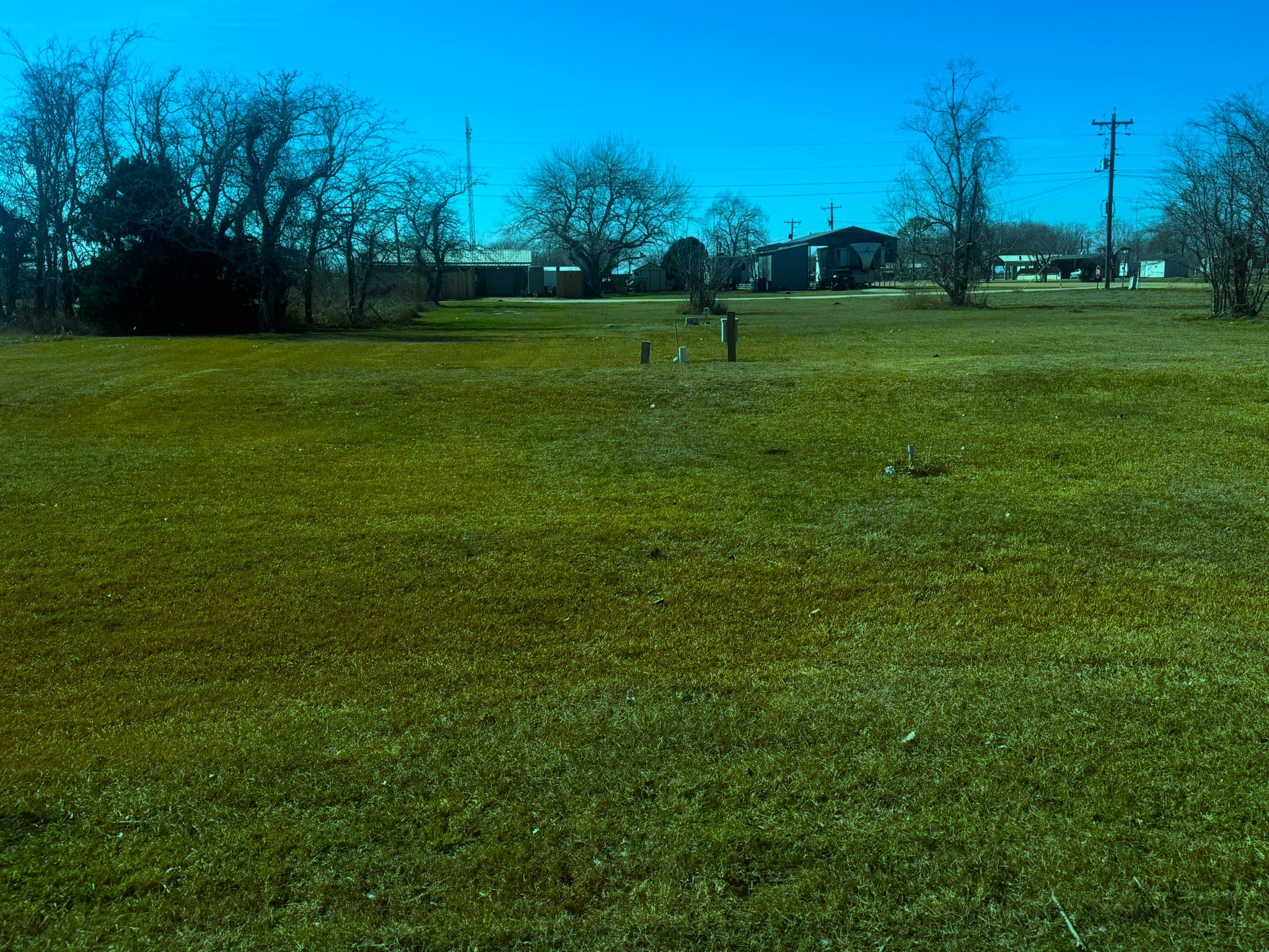 16 Meadowlark South Palacios, TX 77465 - Photo 8 of 22 a view of field with tall trees