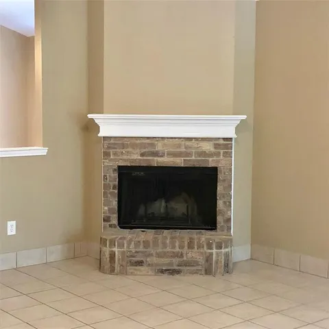 a living room with a fireplace