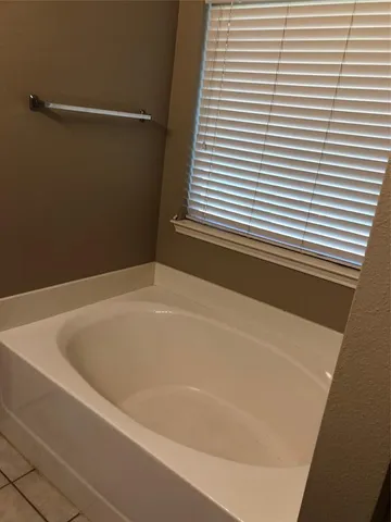 a bathroom with a bathtub