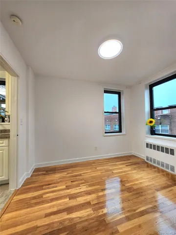 a view of an empty room and window