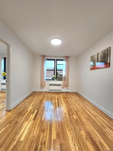 a view of an empty room and window