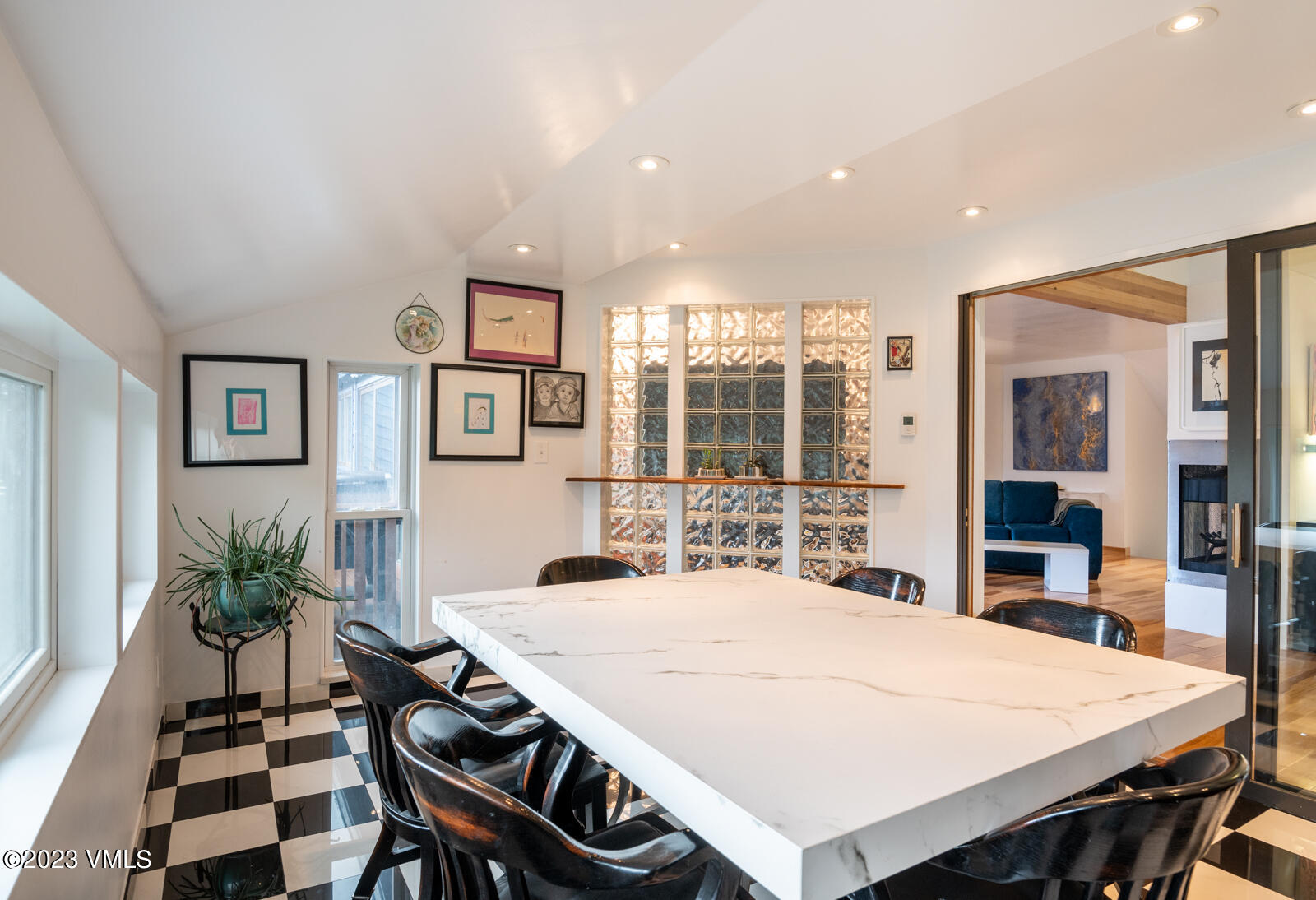 211 Nottingham Road, Unit D Avon, CO 81620 - Photo 13 of 35 a dining room with a table and chairs