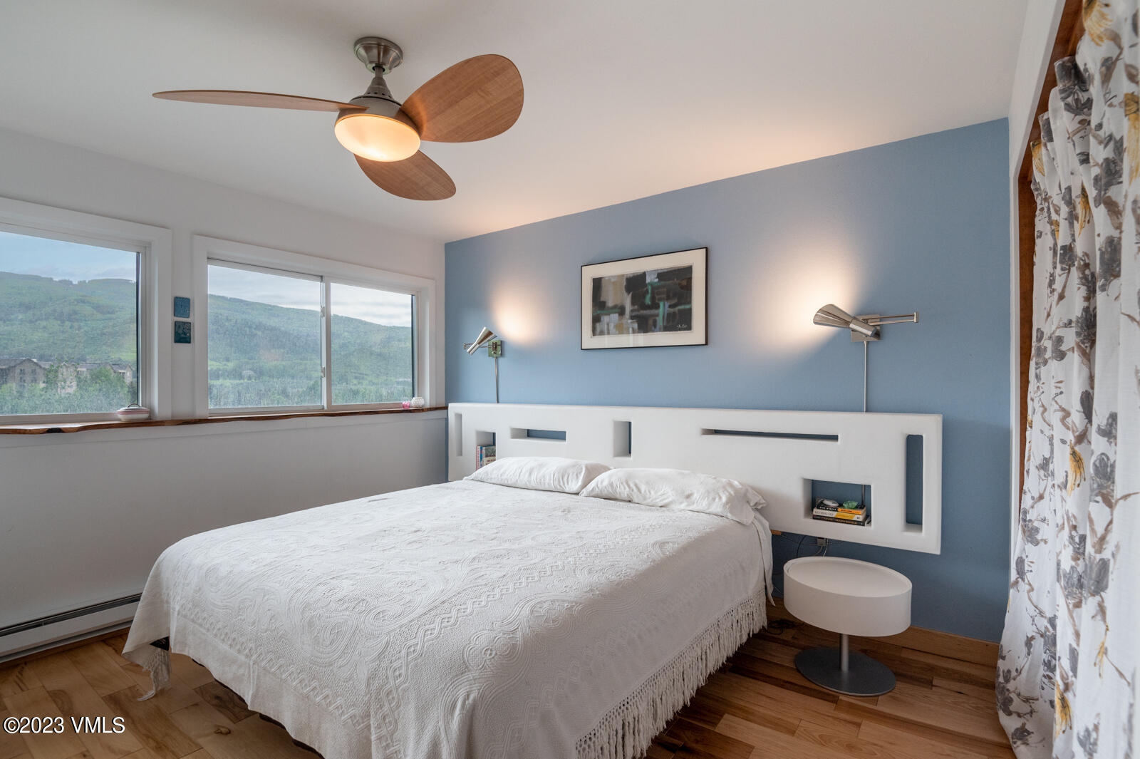 211 Nottingham Road, Unit D Avon, CO 81620 - Photo 14 of 35 a bedroom with a bed and a window