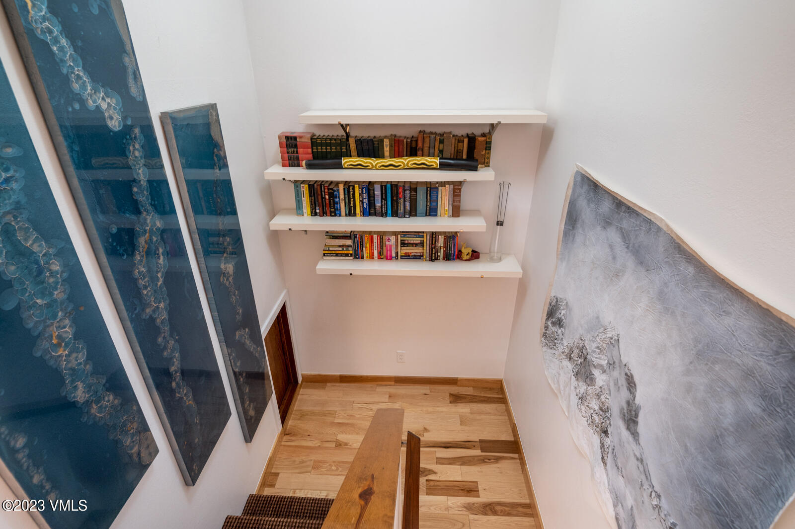211 Nottingham Road, Unit D Avon, CO 81620 - Photo 18 of 35 a view of staircase with white walls washer and dryer