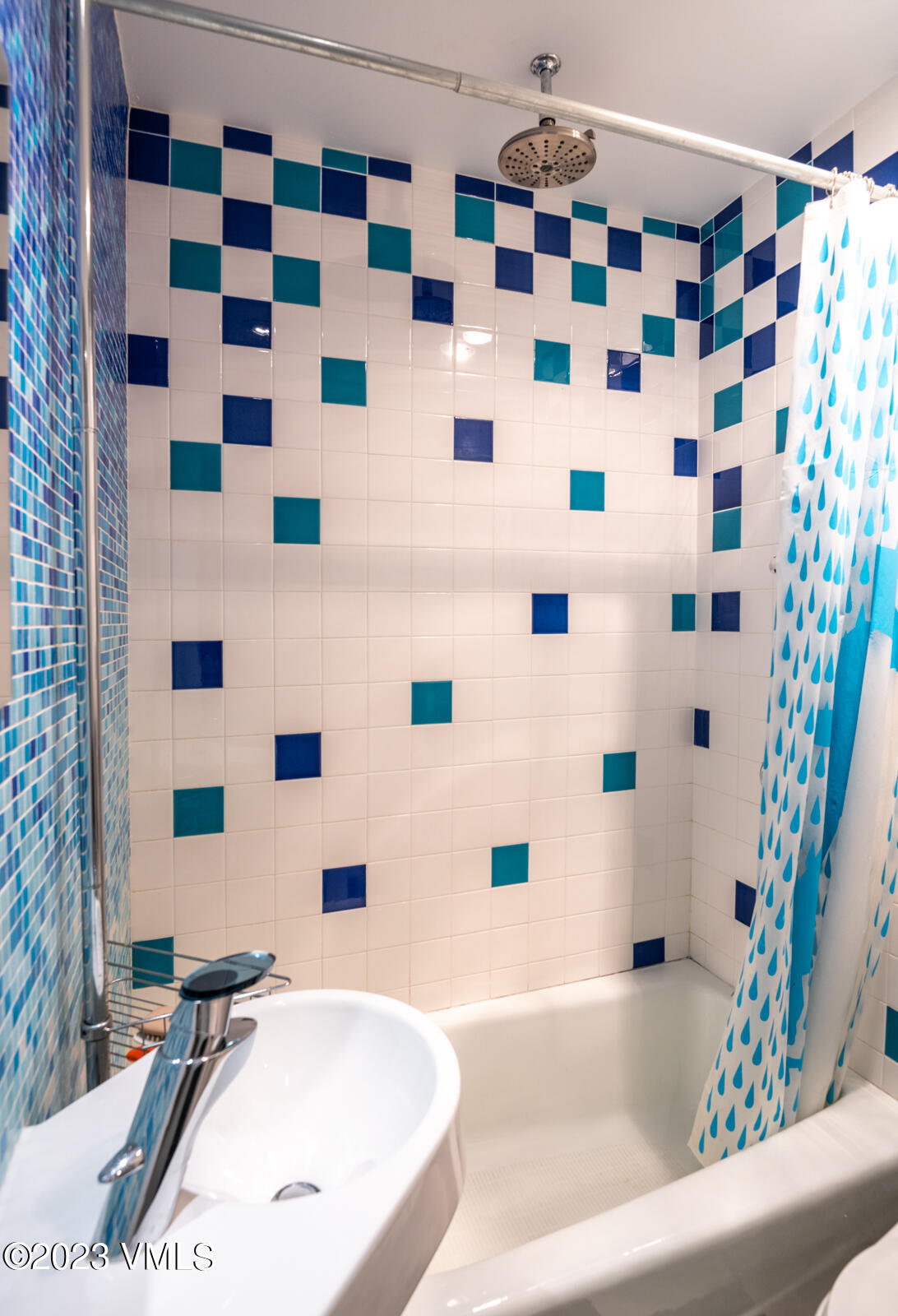 211 Nottingham Road, Unit D Avon, CO 81620 - Photo 26 of 35 a bathroom with a sink and a bathtub