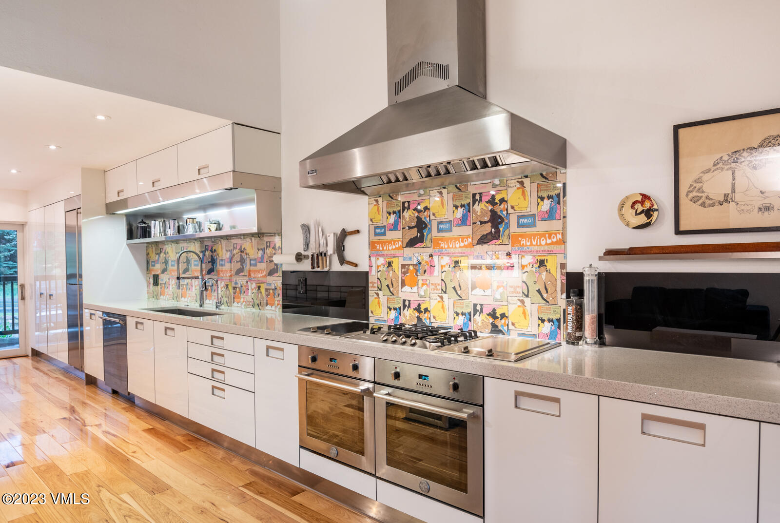 211 Nottingham Road, Unit D Avon, CO 81620 - Photo 4 of 35 a kitchen with stainless steel appliances granite countertop a stove and a sink