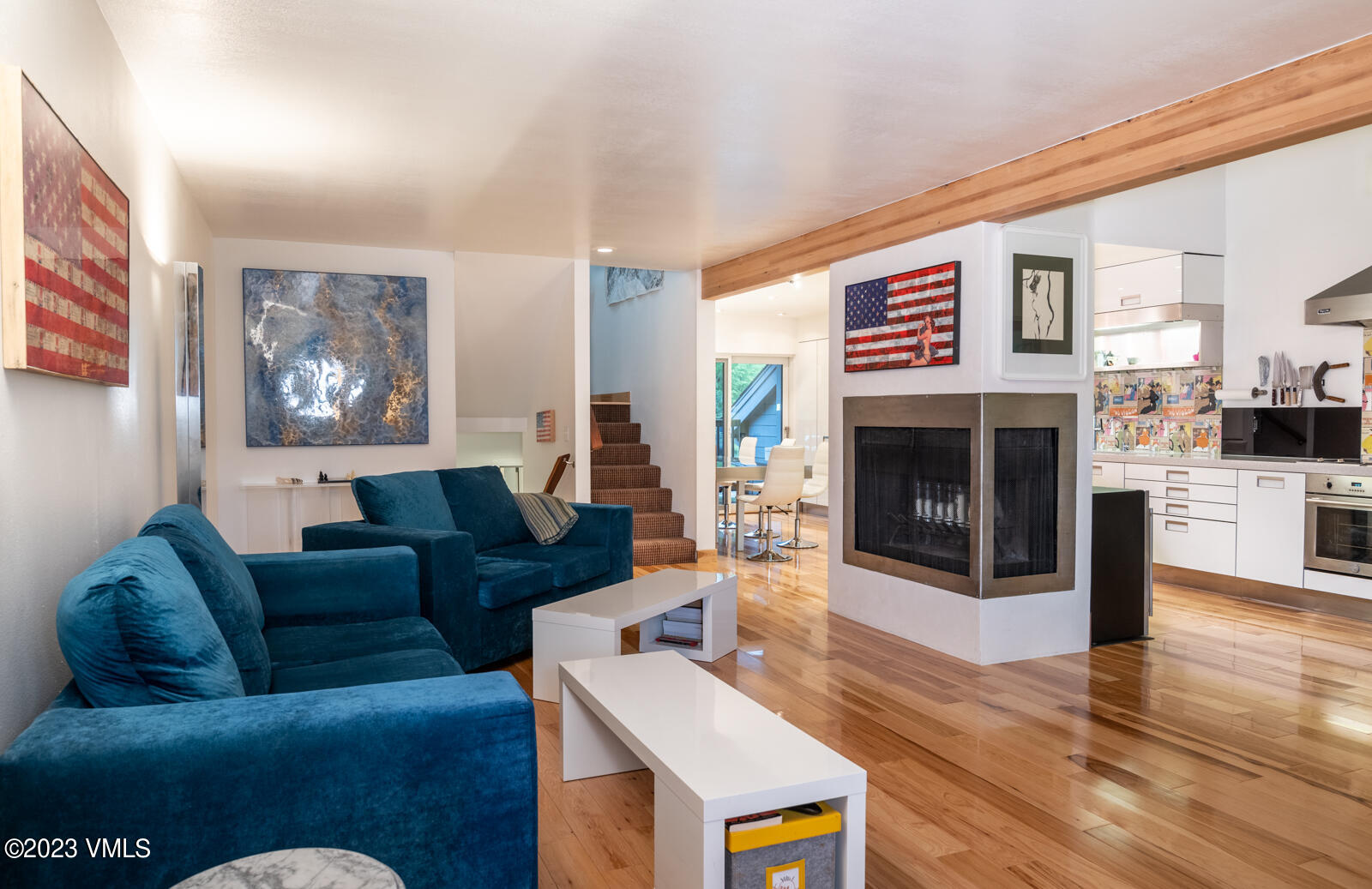 211 Nottingham Road, Unit D Avon, CO 81620 - Photo 7 of 35 a living room with furniture and a fireplace