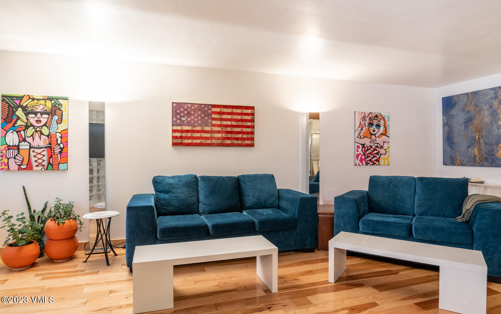211 Nottingham Road, Unit D Avon, CO 81620 - Photo 8 of 35 a living room with furniture and a wooden floor