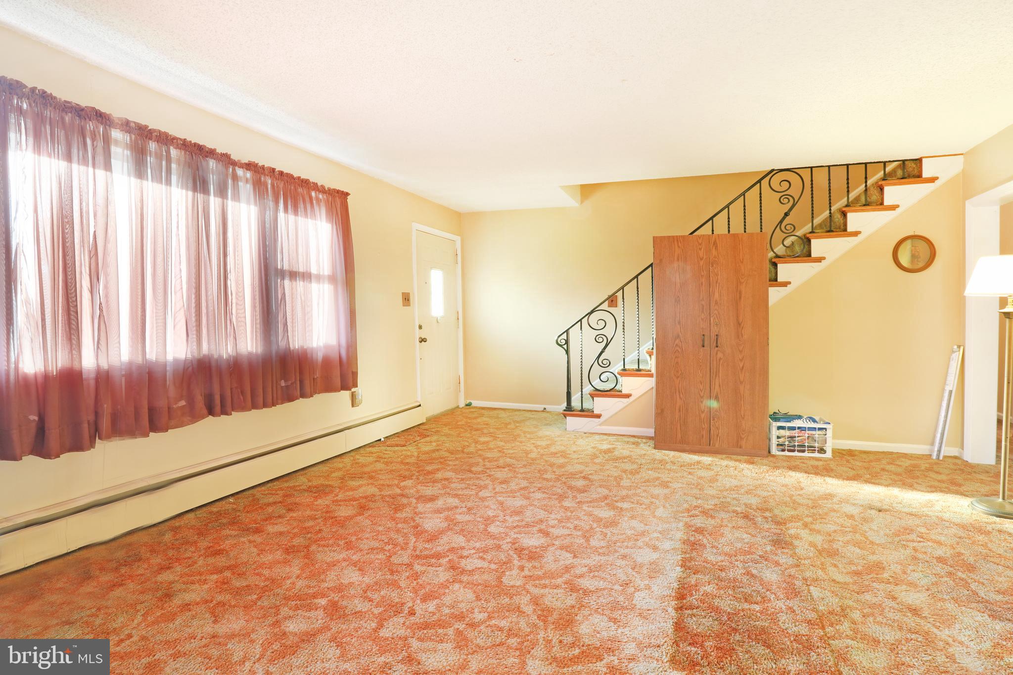 870 Rambler Avenue Runnemede, NJ 08078 - Photo 8 of 30 Living Room with hardwood floors under the carpet