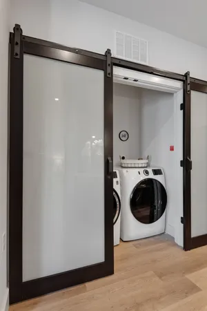 a utility room with dryer and washer
