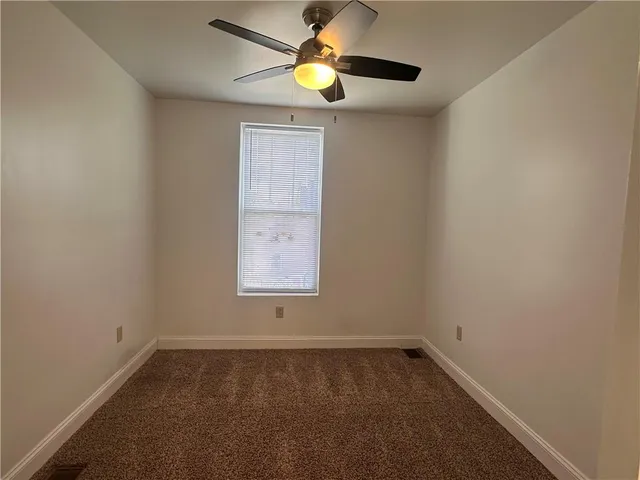 an empty room with closet