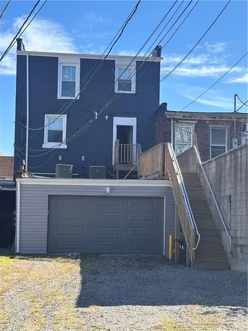 a view of kitchen and wooden floor