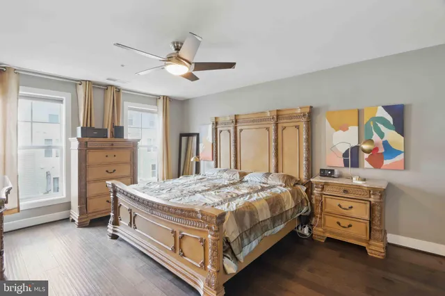 a bed room with a bed and a chandelier