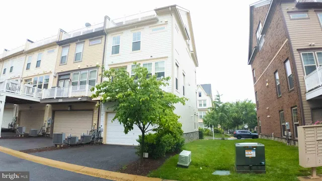 a front view of a building with garden