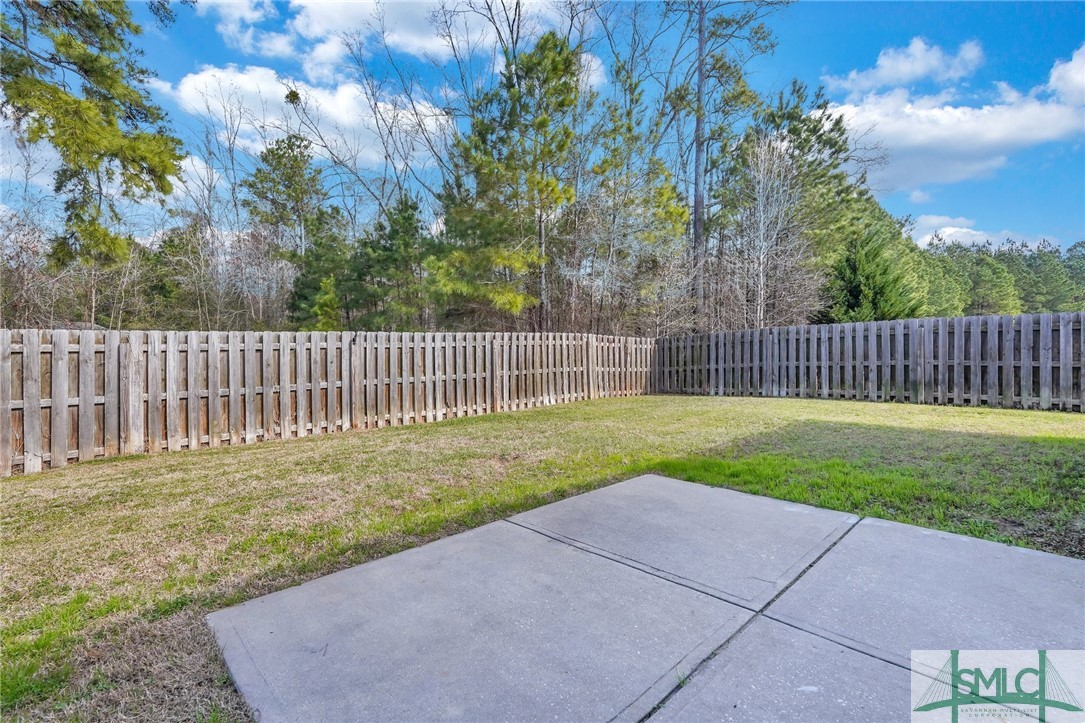 20 Old Mill Road Port Wentworth, GA 31407 - Photo 19 of 24 backyard patio with privacy fence