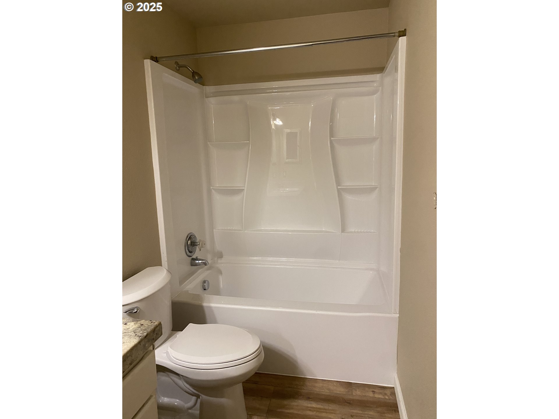 9872 Southeast Talbert Street Clackamas, OR 97015 - Photo 20 of 38 a bathroom with a toilet and a shower