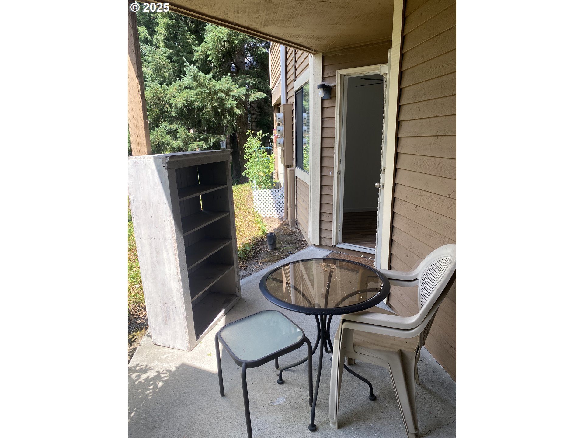 9872 Southeast Talbert Street Clackamas, OR 97015 - Photo 22 of 38 a table room with a chair and a large window