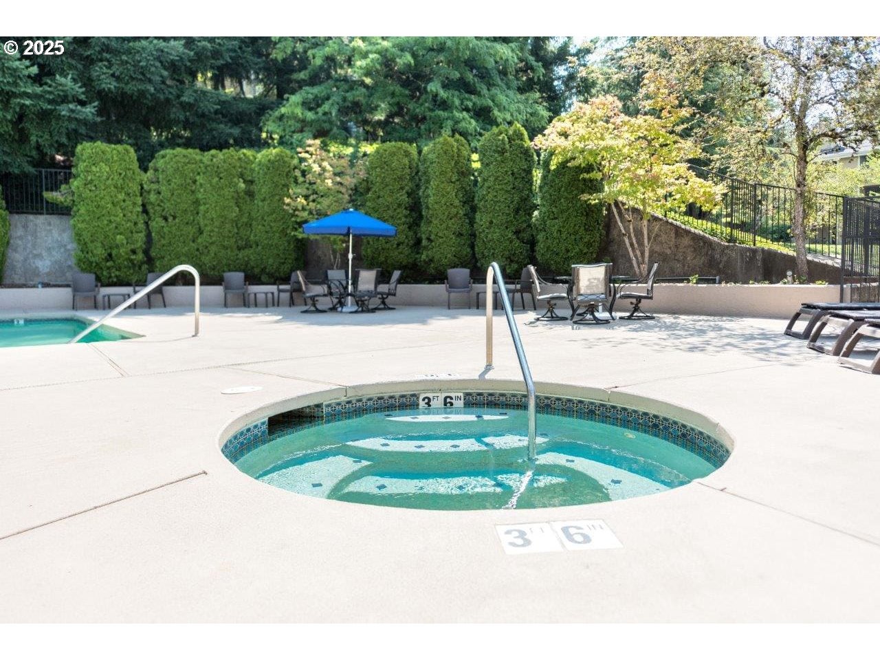 9872 Southeast Talbert Street Clackamas, OR 97015 - Photo 28 of 38 a view of a swimming pool with a patio
