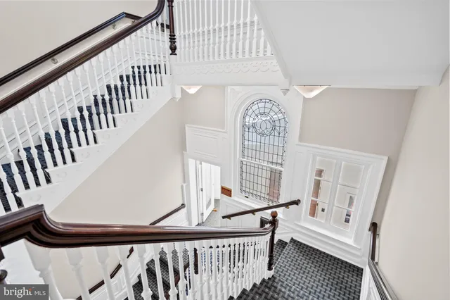 a view of entryway with wooden floor