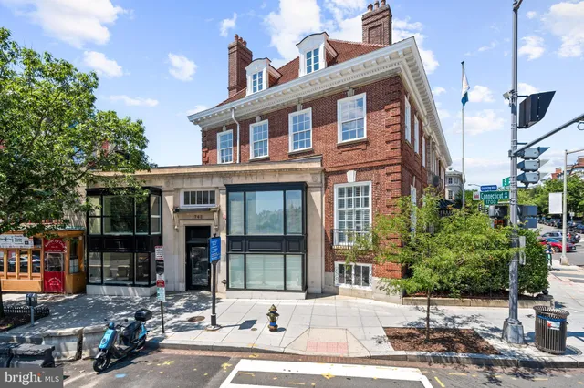a front view of a building and street
