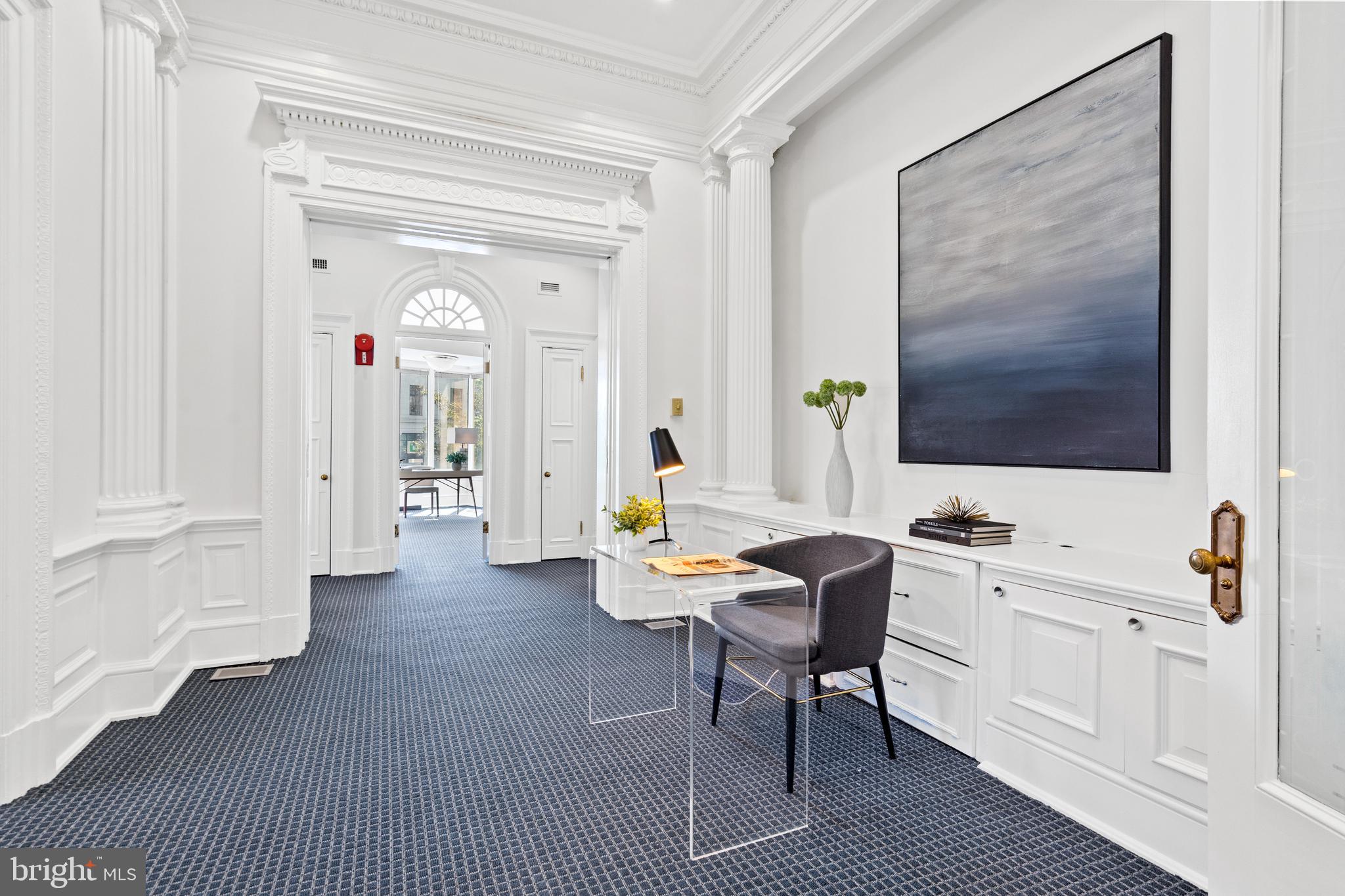 2040 South Street Northwest Washington, DC 20009 - Photo 8 of 19 a living room with furniture and a table