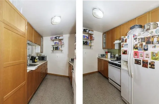 a kitchen with stainless steel appliances granite countertop a refrigerator and a stove