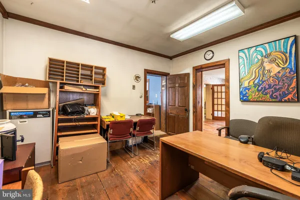 a view of a workspace with furniture