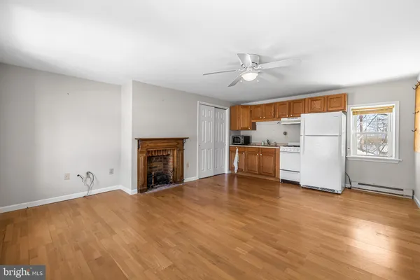 a bathroom with a tub and shower