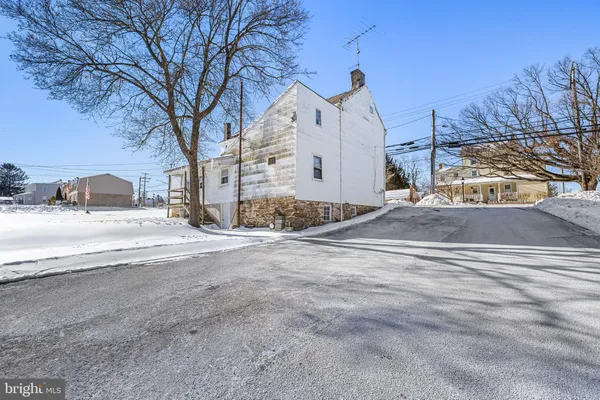 a view of a street with houses