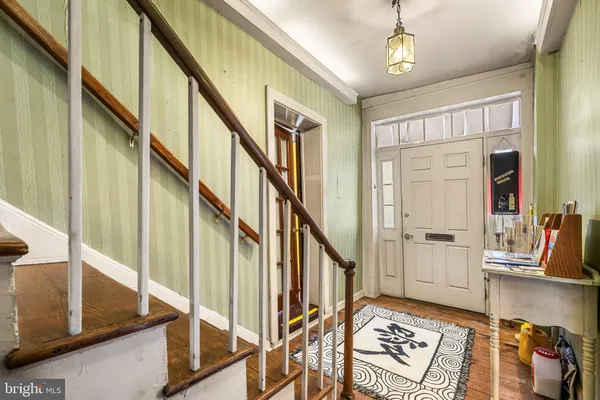 a room with furniture and a wooden floor