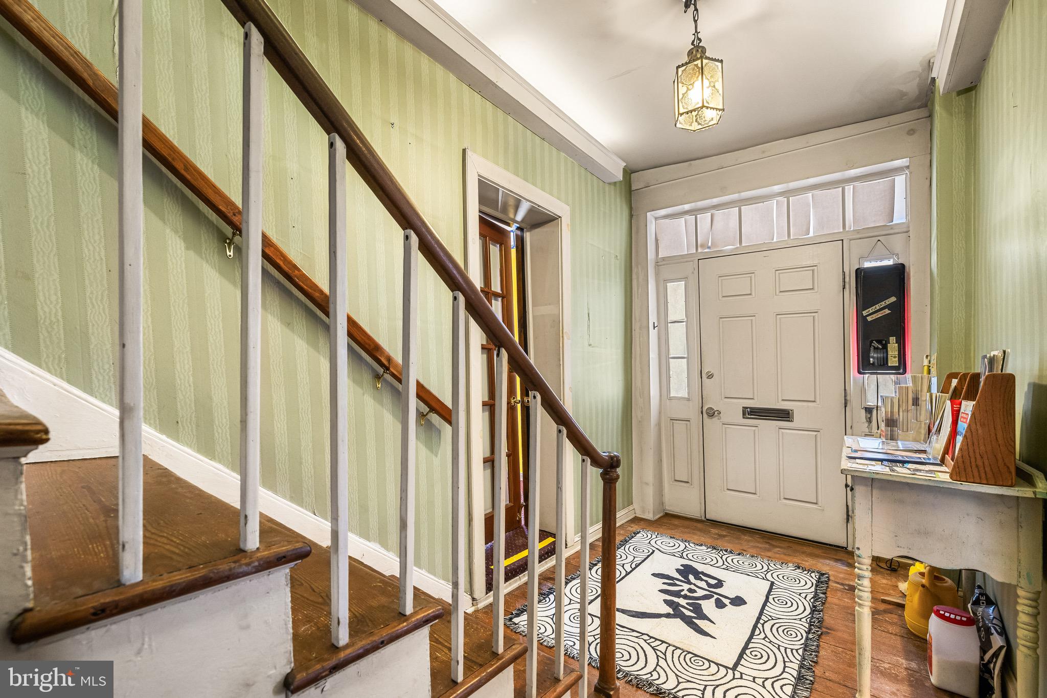 1421 North Main Street Hampstead, MD 21074 - Photo 5 of 44 a view of an entryway with wooden floor and windows