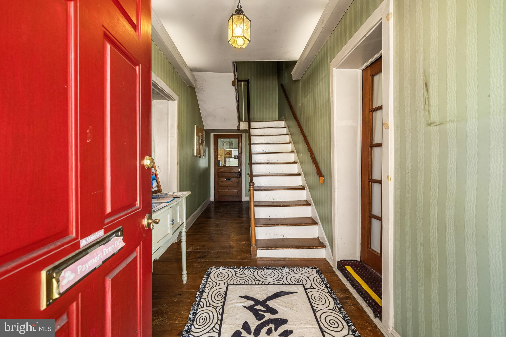 1421 North Main Street Hampstead, MD 21074 - Photo 7 of 44 a view of an entryway with furniture and stairs