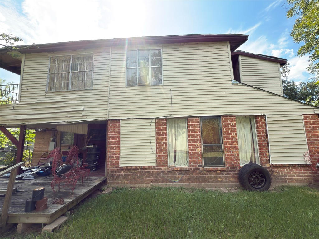 10106 Cheeves Drive Houston, TX 77016 - Photo 12 of 12 a view of a house with a yard and sitting area