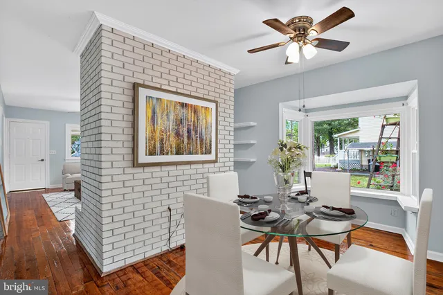 a workspace with furniture and window