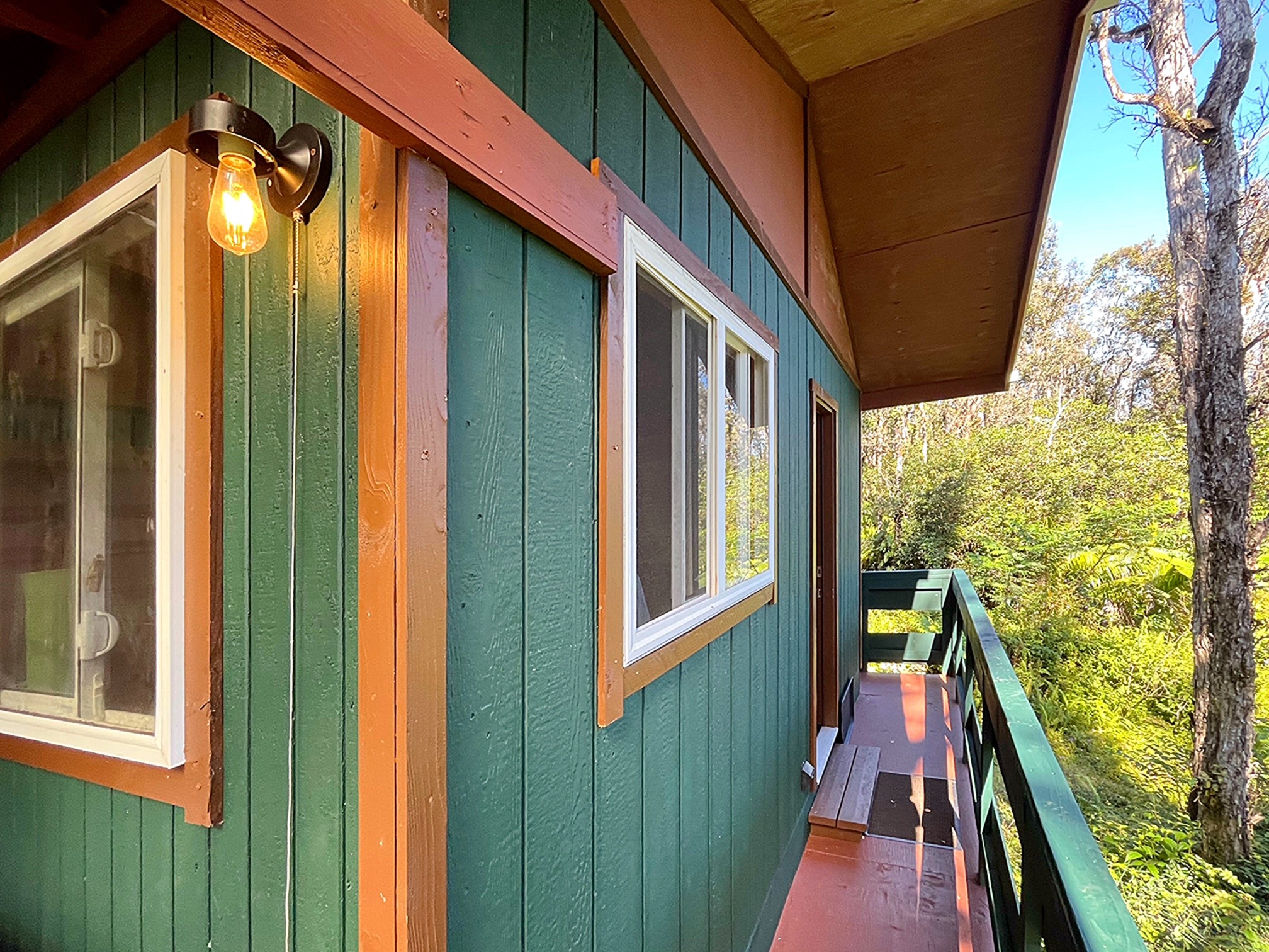 12-4275 Upper Puna Road Pahoa, HI 96778 - Photo 12 of 22 a view of balcony with wooden floor and outdoor space