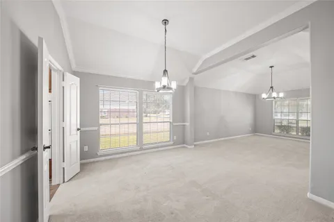 a kitchen with stainless steel appliances a sink stove and cabinets