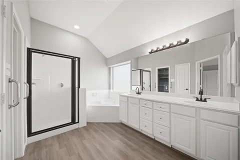 a area with wooden floor and closet