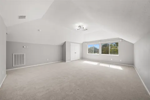 a view of backyard with a small cabin